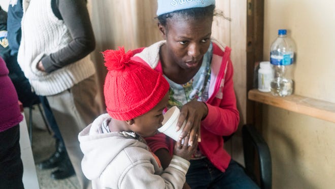 Modeline Joseph, 22, a Haitian migrant, traveled to Nogales, Sonora, with her 4-year-old son, Andres Sebastian, from Venezuela, where she had been living since 2009. She said the boy's father had been killed in Venezuela, and now she was hoping to cross into the U.S. through the port of entry in Nogales, and then head to New Jersey, where an uncle lives.