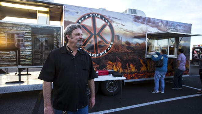 Rep. Kevin Payne poses for a portrait in front of his K Star BBQ food truck on Friday, Feb. 2, 2018 in Glendale, Ariz. Payne has proposed a bill that would remove several regulations for food trucks.