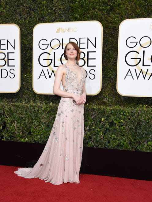Emma Stone arrives at the  Golden Globe Awards at the Beverly Hilton Hotel on Jan. 8, 2017 in Beverly Hills, Calif.