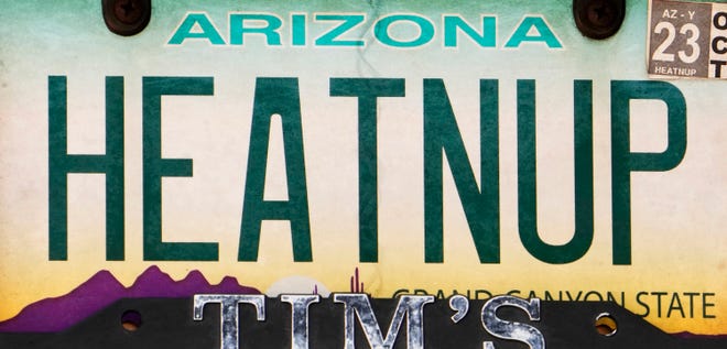 An Arizona license plate in Sedona on July 10, 2023, sums up the weather forecast this week: “HEAT N UP.”