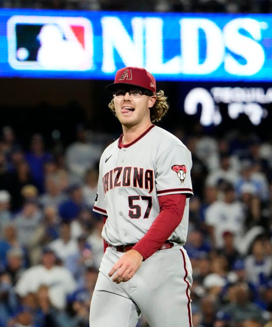 Arizona Diamondbacks relief pitcher Andrew Saalfrank (57) reacts as he leaves the game against the Los Angeles Dodgers in the sixth inning during Game 2 of the NLDS at Dodger Stadium in Los Angeles on Oct. 9, 2023.