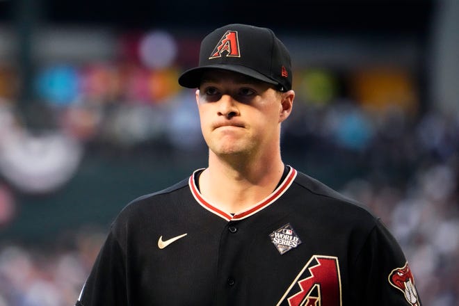Arizona Diamondbacks starting pitcher Joe Mantiply (35) walks to the dugout during a pitching change against the Texas Rangers during the second inning in game four of the 2023 World Series at Chase Field in Phoenix on Oct. 31, 2023.