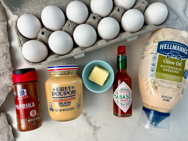 You only need a handful of ingredients to make deviled eggs.