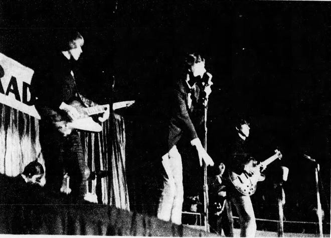 The Rolling Stones are pictured with the caption, "The beat of the drums, the beat of the guitars, the bass," in this photo that appeared in The Arizona Republic on Jan. 2, 1966.