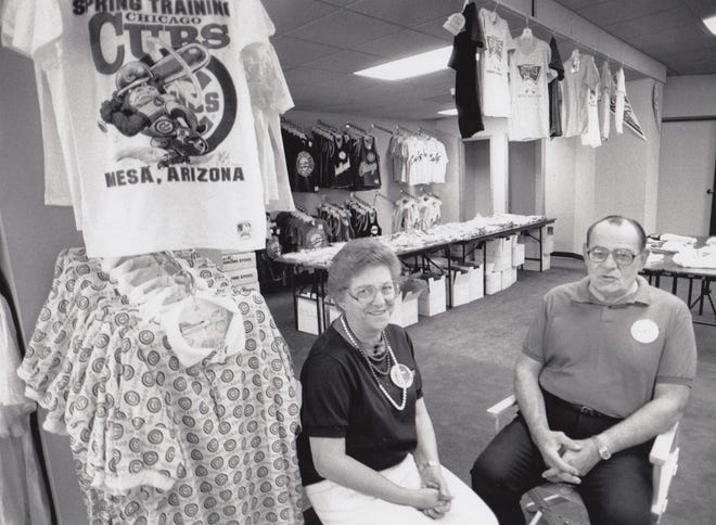 Co-managers Jo Ann and Mike Kuntz sit in their store during spring training Feb. 24, 1990.