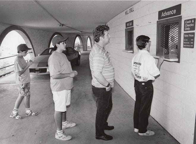 Tom Klint, of Cave Creek, and Pete Gruenberger, of Tempe, stand in line to purchase tickets for the first scheduled Cactus League game during spring training March 27, 1990.