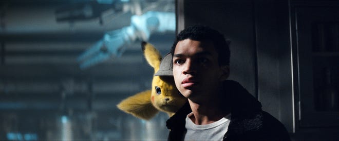 Tim (Justice Smith) didn't always like carrying Pikachu on his shoulder in "Pokemon Detective Pikachu."