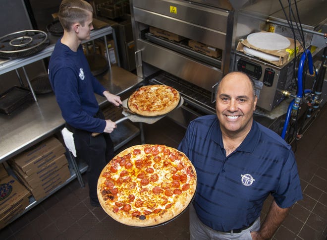 Mike Barro carries on the family tradition at Barro's Pizza. He stops by the store in Glendale on Nov. 15, 2019.