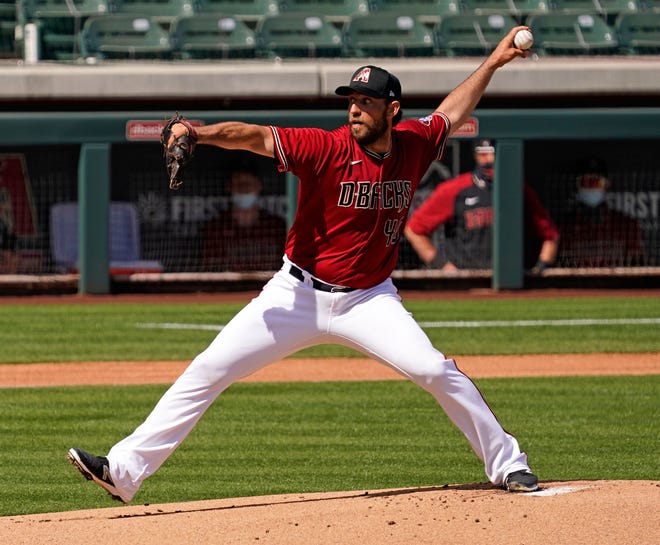 Arizona Diamondbacks starting pitcher Madison Bumgarner (40) throws to the Los Angeles Angels in the first inning during a spring training game at Salt River Fields at Talking Stick in Scottsdale, Ariz., on March 4, 2021.
