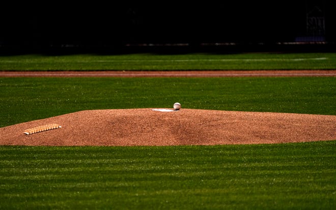 A baseball rests on the mound as the Arizona Diamondbacks play the Los Angeles Angels during a spring training game at Salt River Fields at Talking Stick in Scottsdale on March 4, 2021.