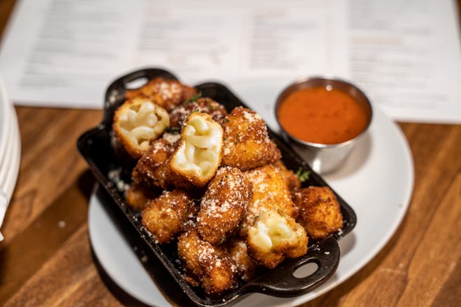 Fried macaroni and cheese bites are a shareable option at The Ainsworth.