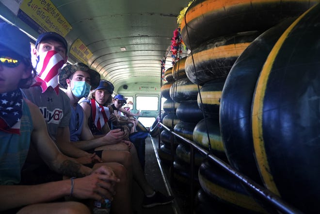 Tubers ride the bus to the Salt River on May 29, 2021.