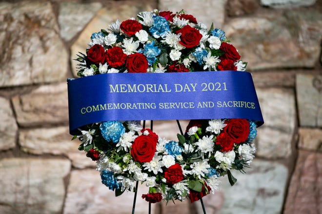 A wreath is presented in honor of Memorial Day at the National Memorial Cemetery of Arizona in Phoenix on May 31, 2021.