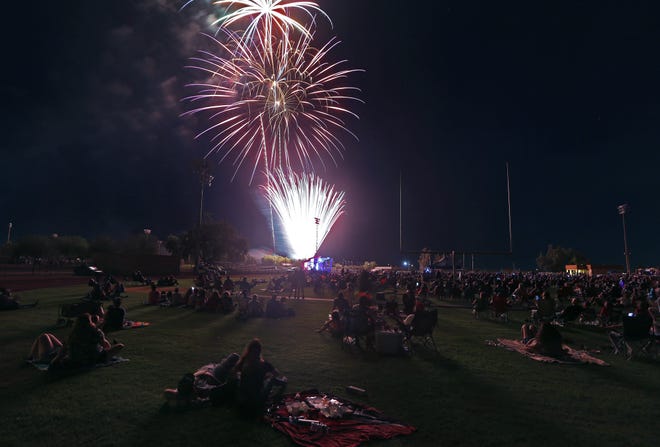 Apache Junction's Fourth of July fireworks light up the sky over Apache Junction High School on July 4, 2021.