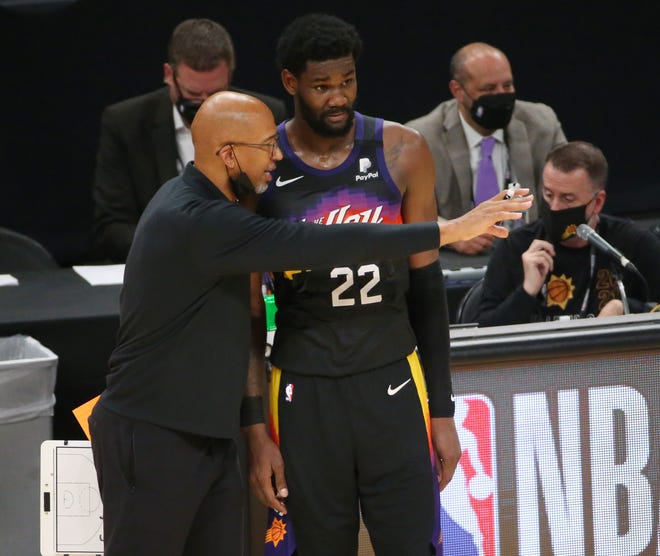 Phoenix Suns head coach Monty Williams talks with center Deandre Ayton (22) during Game 2 of the NBA Finals against the Milwaukee Bucks at Phoenix Suns Arena July 8, 2021.