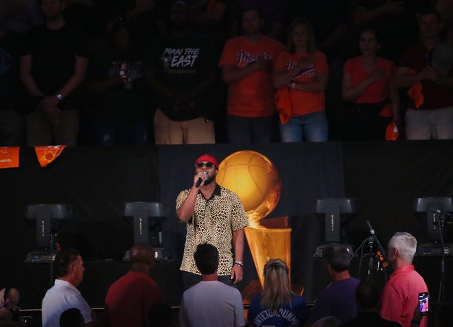 Jan Ross performs the national anthem before Game 2 of the NBA Finals between the Phoenix Suns and the Milwaukee Bucks at Phoenix Suns Arena July 8, 2021.