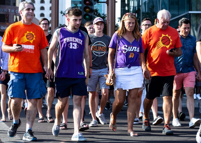 Fans arrive at the Phoenix Suns Arena for Game 2 of the NBA finals vs. the Milwaukee Bucks on July 8, 2021.