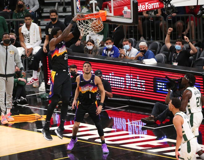 Phoenix Suns center Deandre Ayton (22) slams two against the Milwaukee Bucks during Game 2 of the NBA Finals at Phoenix Suns Arena July 8, 2021.