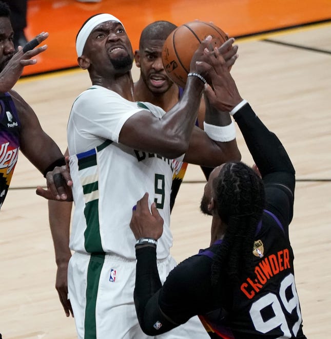 Milwaukee Bucks center Bobby Portis (9) battles for a rebounds during the second quarter of Game 5 of the NBA Finals at Footprint Center in Phoenix on Saturday.