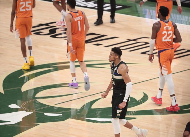 Milwaukee Bucks forward Giannis Antetokounmpo (34) celebrates in the final seconds during Game 6 of the NBA Finals against the Phoenix Suns at Fiserv Forum July 20, 2021.