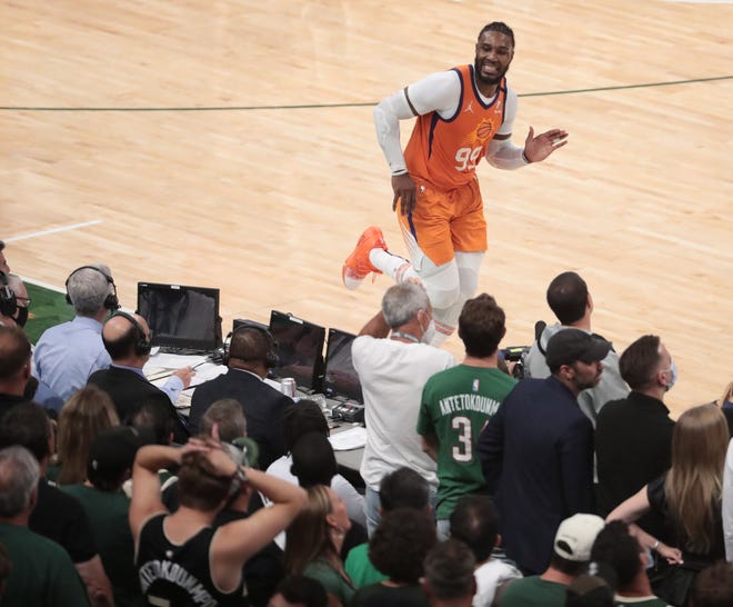 Phoenix Suns forward Jae Crowder (99) turns towards fans after a three point basket against the Milwaukee Bucks during Game 6 of the NBA Finals at Fiserv Forum July 20, 2021.