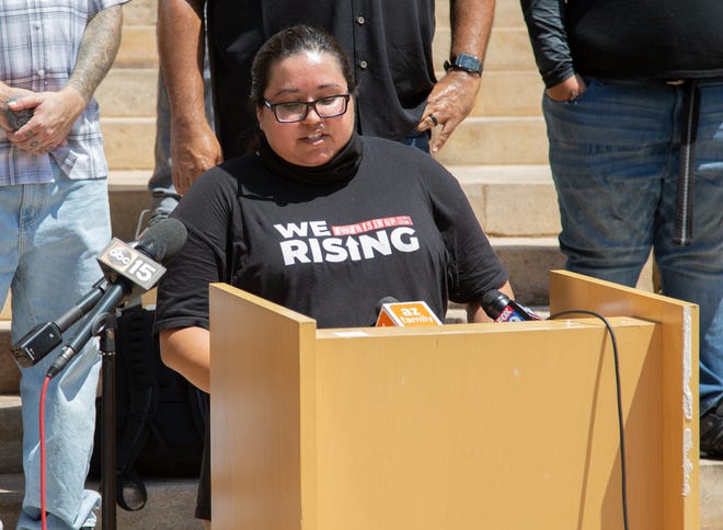 Cynthia Y. Garcia, a member of the W.E. Rising Project, speaks during a news conference at Cesar Chavez Plaza in downtown Phoenix on Aug. 6, 2021. The gathering was a response to the Department of Justice's investigation into the Phoenix Police Department.