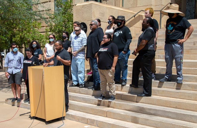 Jacob Raiford, a lead organizer with the W.E. Rising Project, speaks during a news conference at Cesar Chavez Plaza in downtown Phoenix on Aug. 6, 2021. The gathering was a response to the Department of Justice's investigation into the Phoenix Police Department.