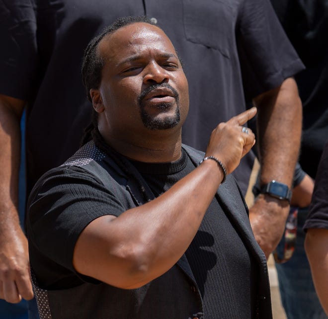 Kenneth Smith, member of Unity Collective, speaks during a news conference at Cesar Chavez Plaza in downtown Phoenix on Aug. 6, 2021. The gathering was a response to the Department of Justice's investigation into the Phoenix Police Department.