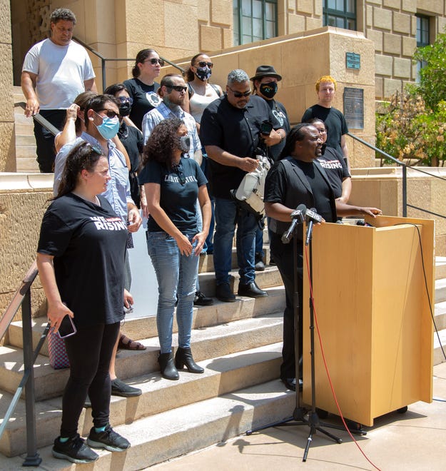Kenneth Smith, member of Unity Collective, speaks during a news conference at Cesar Chavez Plaza in downtown Phoenix on Aug. 6, 2021. The gathering was a response to the Department of Justice's investigation into the Phoenix Police Department.