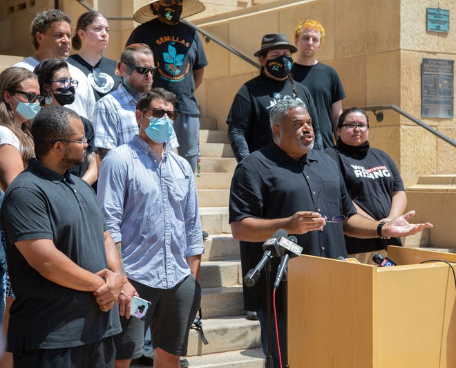 J.J. Westgate, president of the Black Phoenix Institute, speaks during a news conference at Cesar Chavez Plaza in downtown Phoenix on Aug. 6, 2021. The gathering was a response to the Department of Justice's investigation into the Phoenix Police Department.
