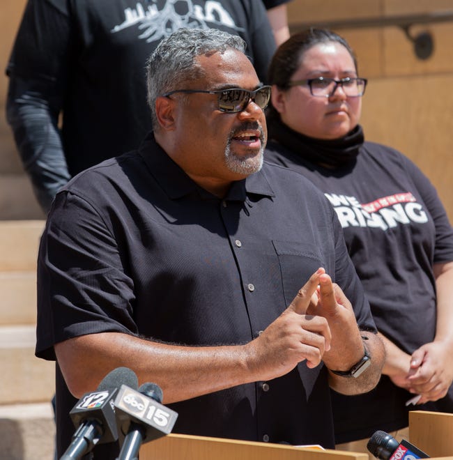 J.J. Westgate, president of the Black Phoenix Institute, speaks during a protest at Cesar Chavez Plaza in downtown Phoenix on Aug. 6, 2021. The gathering is a response to the Department of Justice's investigation into the Phoenix Police Department.