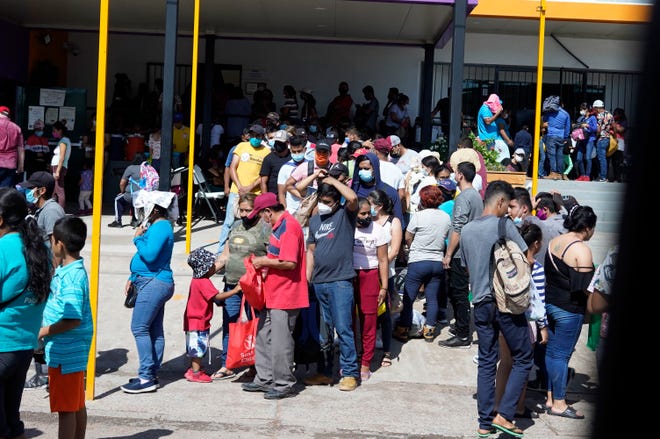 Many migrants were stranded in Nogales, Mexico, under President Trump's Migrant Protection Protocols program. President Biden ended the program, but more than 71,000 asylum seekers had already been sent to Mexico under "Remain in Mexico," according to Syracuse University's Transactional Records Access Clearinghouse.