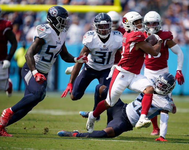 Arizona Cardinals wide receiver Rondale Moore (4) runs the ball during the third quarter at Nissan Stadium Sunday, Sept. 12, 2021 in Nashville, Tenn.

Titans Cards 166