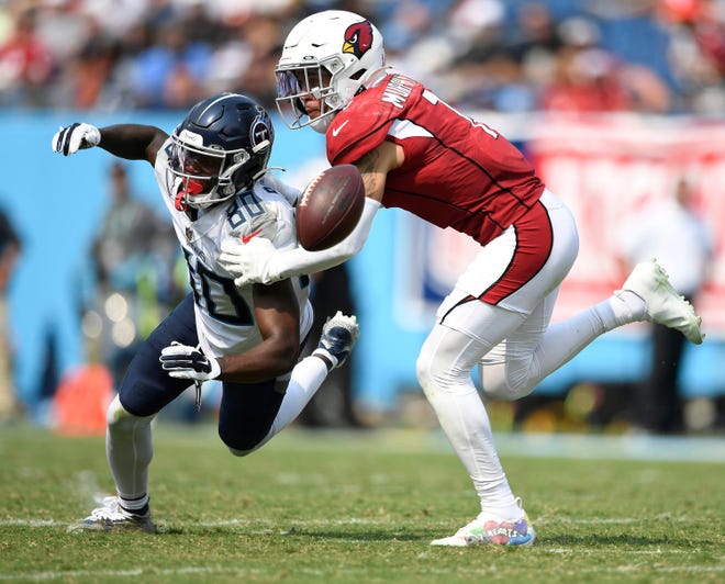 Arizona Cardinals cornerback Byron Murphy (7) breaks up a pass intended for Tennessee Titans wide receiver Chester Rogers (80) during the third quarter at Nissan Stadium Sunday, Sept. 12, 2021 in Nashville, Tenn.

Titans Cards 201