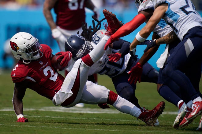Arizona Cardinals running back Chase Edmonds (2) is tackled by Tennessee Titans cornerback Janoris Jenkins (20) during the secondquarter at Nissan Stadium Sunday, Sept. 12, 2021 in Nashville, Tenn.

Titans Cards 113