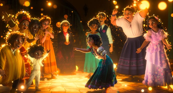"Encanto" features the voices of (clockwise starting from center) Stephanie Beatriz as Mirabel, the only ordinary child in the Madrigal family; Ravi Cabot-Conyers, Rhenzy Feliz and Adassa as Mirabel’s cousins Antonio, Camilo and Dolores, respectively; Mauro Castillo and Carolina Gaitan as Mirabel’s uncle and aunt, Félix and Pepa; María Cecilia Botero as Mirabel’s grandmother, Abuela Alma; Angie Cepeda and Wilmer Valderrama as Mirabel’s parents, Julieta and Agustín; and Jessica Darrow and Diane Guererro as Mirabel’s sisters Luisa and Isabela.