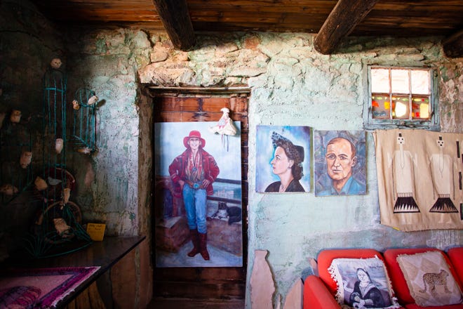 Portraits of Mary Lou Gulley, left, her mother, Frances Bradford Gulley, middle, and her father, builder of The Mystery Castle, Boyce Luther Gulley, right, hang in the Mystery Castle at South Mountain Park on Nov. 19, 2021.