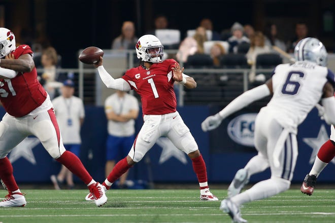 Jan 2, 2022; Arlington, Texas, USA; Arizona Cardinals quarterback Kyler Murray (1) throws a pass in the second quarter against the Dallas Cowboys at AT&T Stadium.