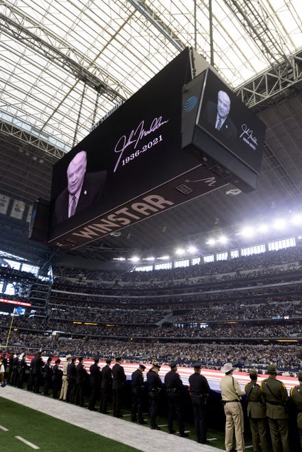 A tribute to John Madden is shown before an NFL football game between the Arizona Cardinals and Dallas Cowboys Sunday, Jan. 2, 2022, in Arlington, Texas. (AP Photo/Michael Ainsworth)