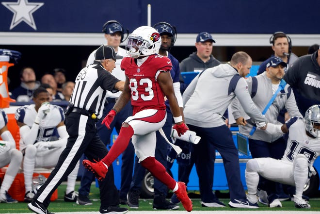 Arizona Cardinals' Greg Dortch (83) reacts after running for a first down against the Dallas Cowboys during the first half of an NFL football game Sunday, Jan. 2, 2022, in Arlington, Texas. (AP Photo/Michael Ainsworth)