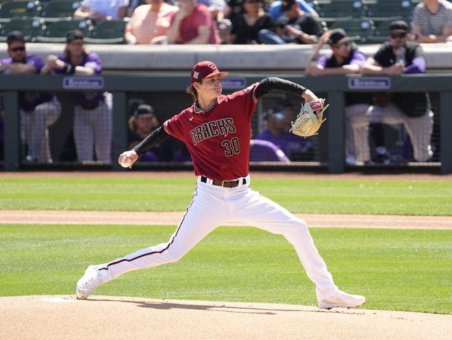 Arizona Diamondbacks pitcher Ryan Nelson throws to the Colorado Rockies in the 1st inning during a spring training game at Salt River Fields in Scottsdale on March 18, 2022.
