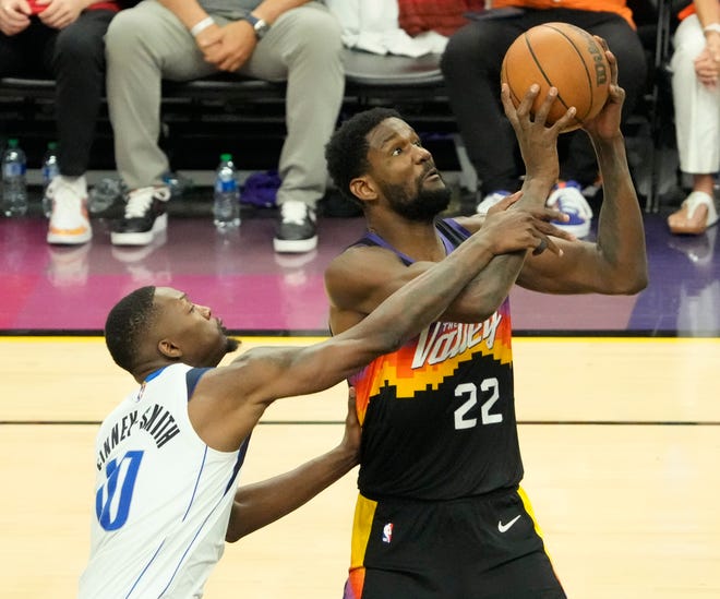 May 15, 2022; Phoenix, Ariz. U.S.; Phoenix Suns center Deandre Ayton (22) is fouled y Dallas Mavericks forward Dorian Finney-Smith (10) during game 7 of the Western Conference semifinals at Footprint Center.