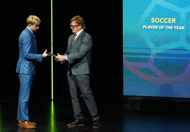 Speed Gregory, Phoenix Country Day School, accepts his award for Boys Soccer Player of the Year during the 2022 Arizona High School Sports Awards program on Saturday night.