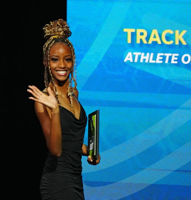 Joy Moorer, North Canyon, accepts her award for Girls Track and Field athlete of the year at the 2022 Arizona High School Sports Awards on Saturday.