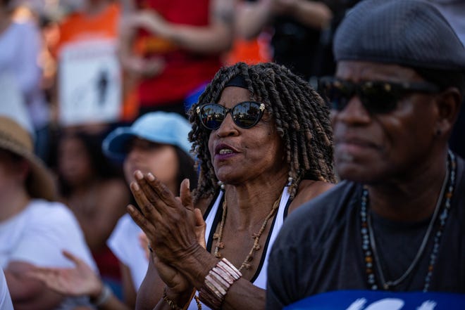 Wanda Right (center) claps outside the Arizona Capitol as a speaker calls for reforms to current gun policies on June 11, 2022, in Phoenix. Hundreds of people participated in the March for Our Lives demonstration in response to recent mass shootings.