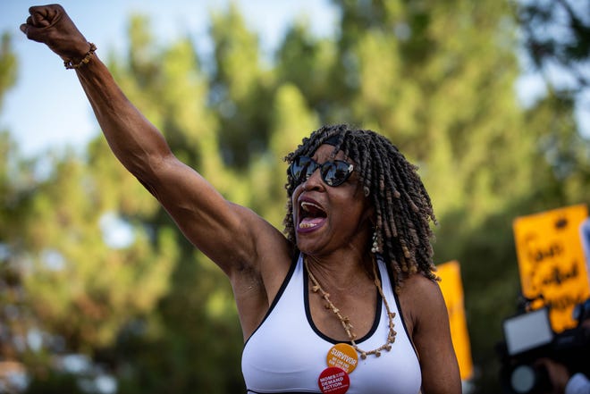 Wanda Right cheers outside the Arizona Capitol as a speaker calls for reforms to current gun policies on June 11, 2022, in Phoenix. Hundreds of people participated in the March for Our Lives demonstration in response to recent mass shootings.