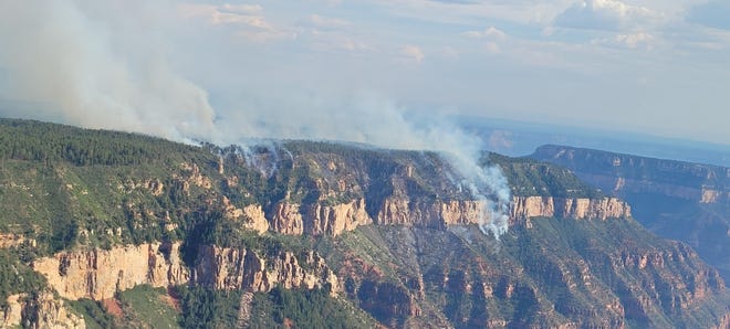 An aerial view of the Dragon Fire as it burns on the North Rim of Arizona's Grand Canyon National Park on July 21, 2022.