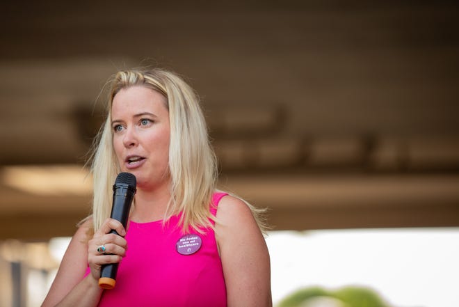Lindsey Nelson, a volunteer with the abortion clinic escort program, speaks about her decision to get an abortion and the repercussions of overturning Roe v. Wade at a storytelling event organized by the local chapter of Planned Parenthood in Phoenix on July 25, 2022.
