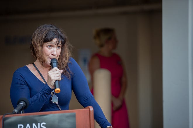 Carrie speaks about the repercussions of overturning Roe v. Wade at a storytelling event organized by the local chapter of Planned Parenthood in Phoenix on July 25, 2022.