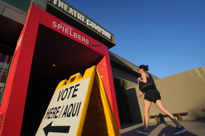 Voters enter the polling station at the Phoenix Art Museum on Aug. 2, 2022, to vote in the primary election.